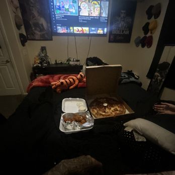 Jesse's Pizza - a pizza and a box of doughnuts - Pizza Near Me - Rosamond, California