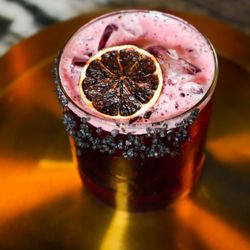 Our Hibiscus Margarita brings vibrant flavors and elegant presentation.