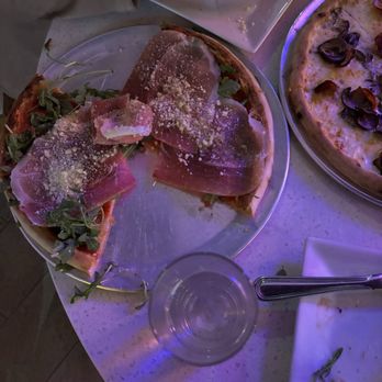 Macoletta - Half eaten gluten free prosciutto and arugula pizza - Pizza Near Me - New York, New York