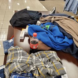 Kohl's - Half empty Coke and goods that do not belong with the clothes