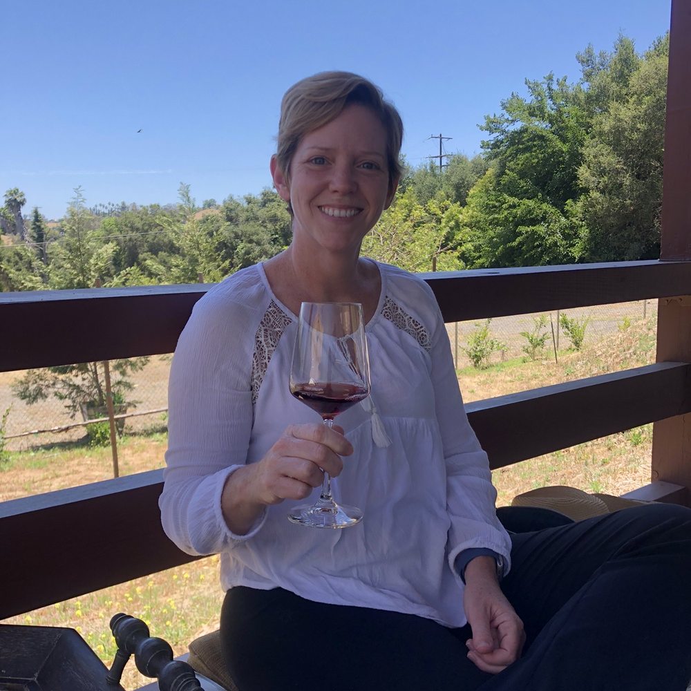Myrtle Creek Vineyards - My sister enjoying a tasting on the deck. - Wine Tasting Room Near Me - Fallbrook, California Myrtle Creek Vineyards - My sister enjoying a tasting on the deck. - Wine Tasting Room Near Me - Fallbrook, California