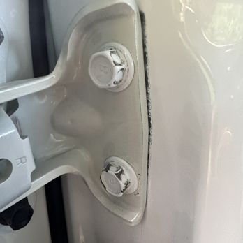 MS Auto - The door they replaced isn't even aligned correctly and they didn't repaint the bolts that hold the door on - Body Shops Near Me - Hilo, Hawaii