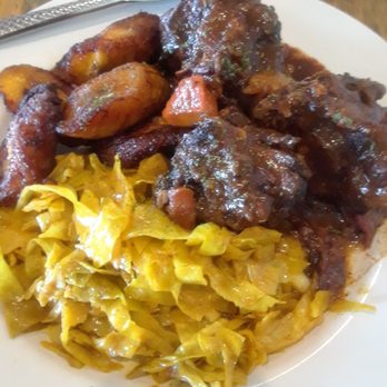 Mad Cow Grill - Unforgettable Braised Oxtails, Curried Cabbage, and plantain - American Near Me - Laurel, Maryland