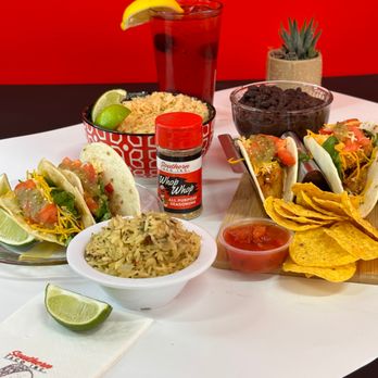 Southern Taco - mexican food and drinks on a table - Tacos Near Me - Baldwin Hills, California Southern Taco - mexican food and drinks on a table - Tacos Near Me - Baldwin Hills, California