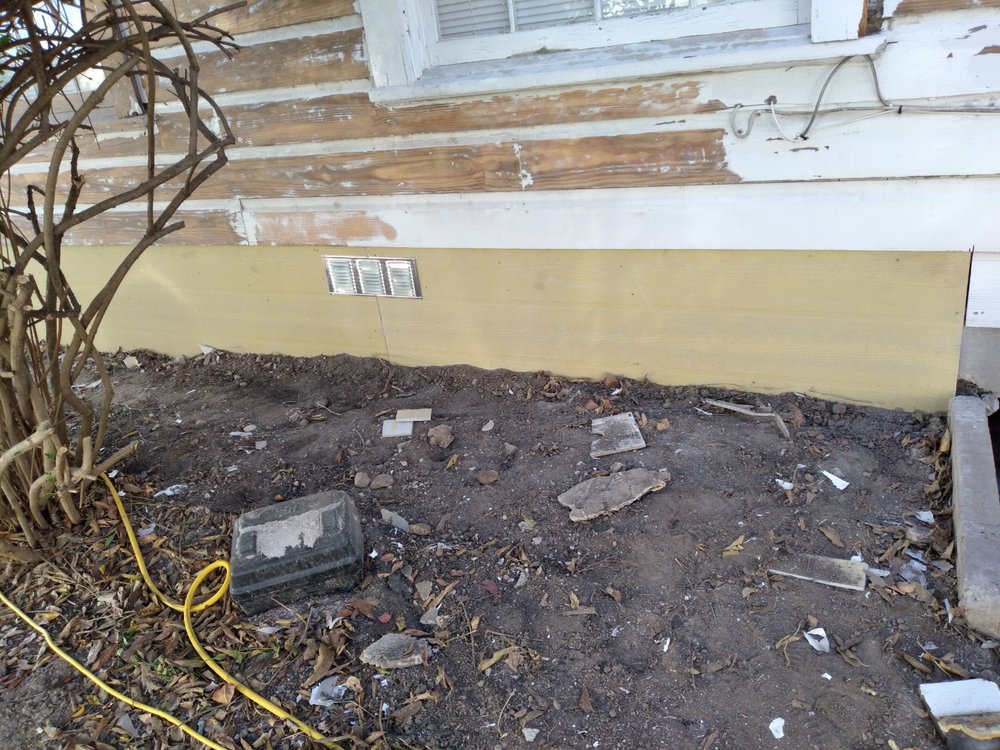 Slide of New Millennium House Remodeling