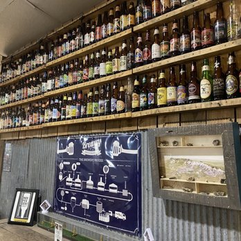Center Pivot Restraurant And Brewery - shelves of beer bottles - Brewpubs Near Me - Colby, Kansas