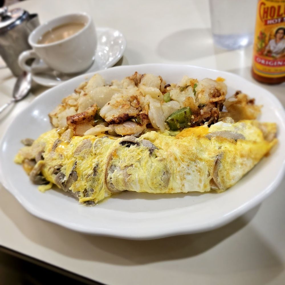 Mushroom, spinach, cheddar omelette. Always a solid breakfast Mushroom, spinach, cheddar omelette. Always a solid breakfast