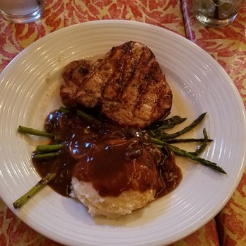 Rams Head Tavern - Grilled chop with mash and gravy with a side of asparagus. - American Near Me - Annapolis, Maryland Rams Head Tavern - Grilled chop with mash and gravy with a side of asparagus. - American Near Me - Annapolis, Maryland