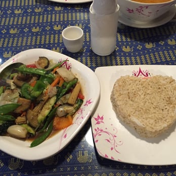 Thai Cuisine - Pad Ma Kua (eggplant) and brown rice in a thoughtful pattern - Thai Near Me - Austin, Texas Thai Cuisine - Pad Ma Kua (eggplant) and brown rice in a thoughtful pattern - Thai Near Me - Austin, Texas