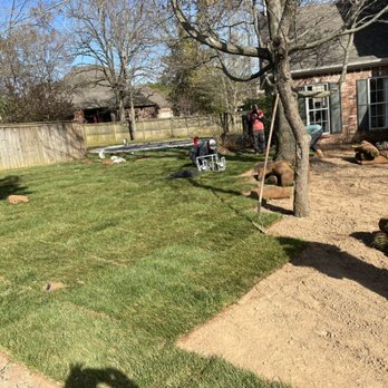Martel's Landscaping - Laying down that beautiful Fescue sod! - Landscaping Near Me - Springdale, Arkansas