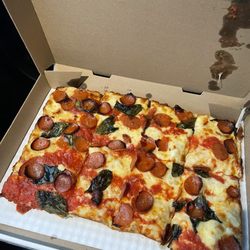 Crispelli's Bakery & Pizzeria - Deep dish with pepperoni and basil.