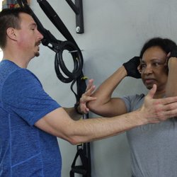 Live Good Fitness - Mac Working with Client