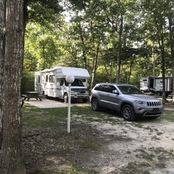 Beachcomber Camping Resort - Typical full hookup campsite