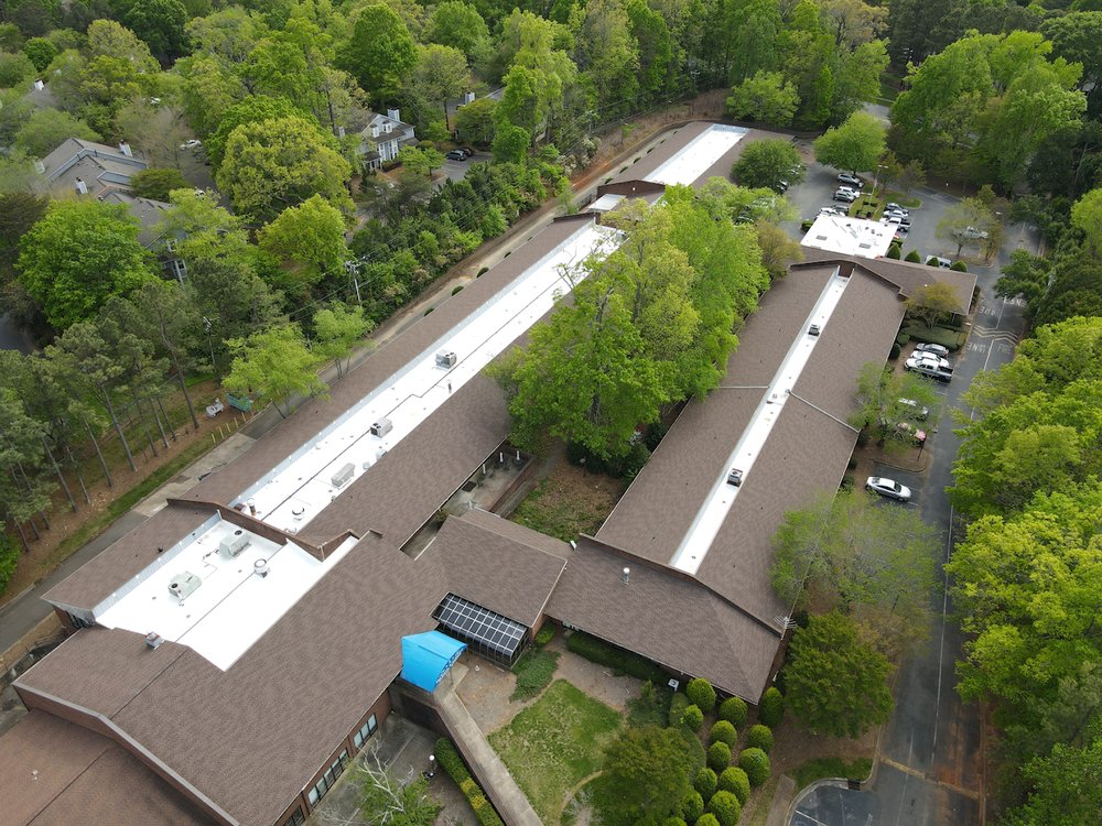 Slide of KH Commercial Roofing