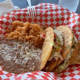2 crunchy tacos w/ rice and beans combo plate. $9.99 2 crunchy tacos w/ rice and beans combo plate. $9.99