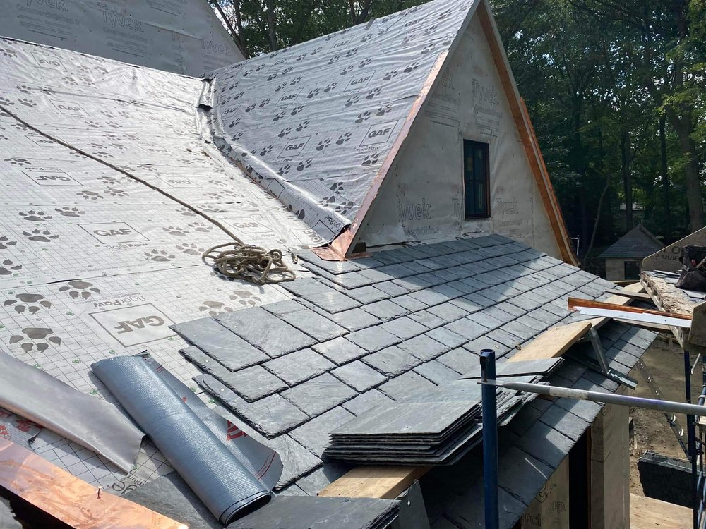 Slide of Sagan Commercial Roofing