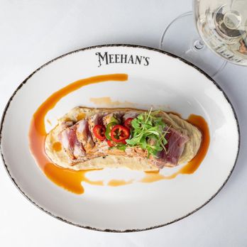Meehan's Chophouse - Melt-in-your-mouth Seared Ahi Tuna over a bed of Japanese sweet potatoes finished with a jalapeño ponzu . - Steakhouses Near Me - Mansfield, Texas