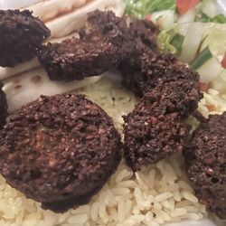 Burnt falafel; burnt all the way through.