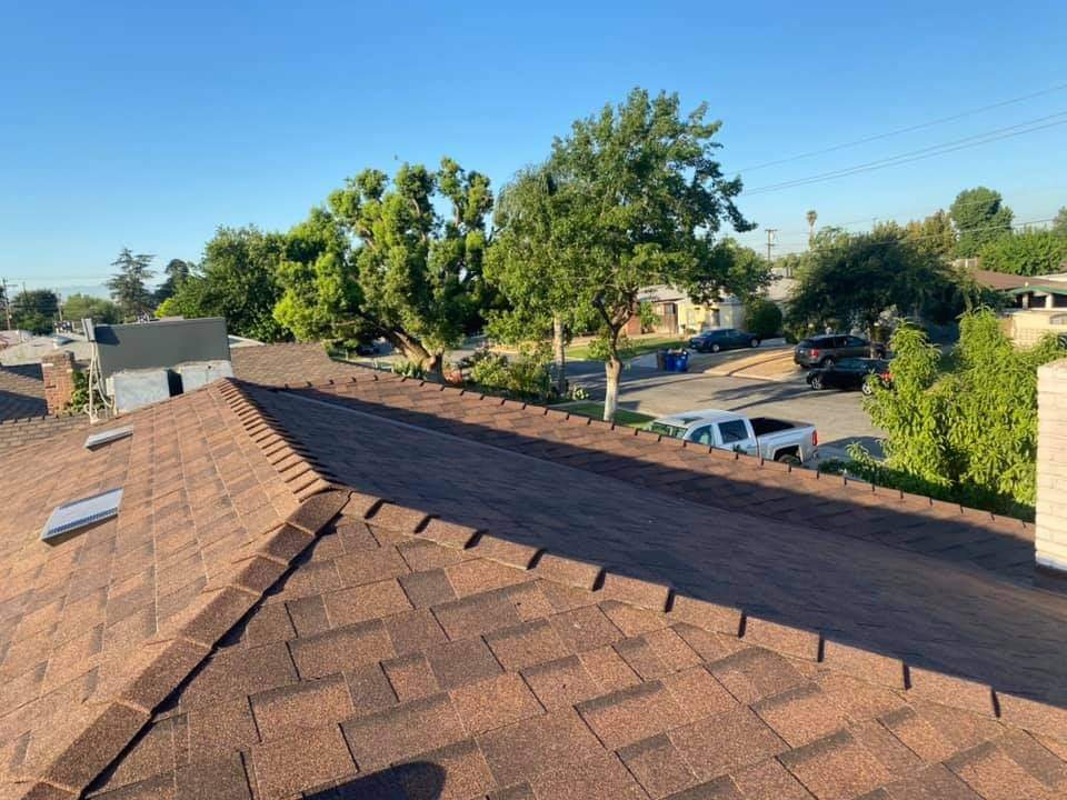 Slide of Ed and J United Roofing