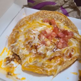 Mexican pizza that was overcooked and just flopped in the container