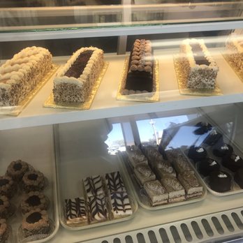 Le Chantilly - a variety of pastries in a display case - Bakeries Near Me - Albuquerque, New Mexico