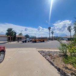 Butterfield Elementary School - School bus number 303, continues to navigate around vehicles even though there is no reason for them to be on this street.