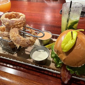 Hops Burger Bar - The Hops Classic Burger sub pepper Jack cheese + avocado with Carolina Red Onion Rings - Burgers Near Me - Greensboro, North Carolina Hops Burger Bar - The Hops Classic Burger sub pepper Jack cheese + avocado with Carolina Red Onion Rings - Burgers Near Me - Greensboro, North Carolina