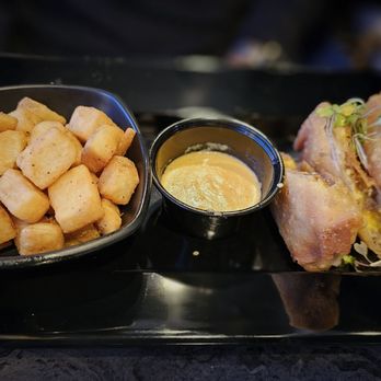 First Class Luxury Lounge GSO - Steak and egg egg rolls with breakfast potatoes - Restaurants Near Me - Greensboro, North Carolina