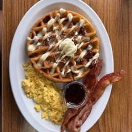 Waffle Platter w/Cinnaroll Waffle, bacon, and eggs Waffle Platter w/Cinnaroll Waffle, bacon, and eggs