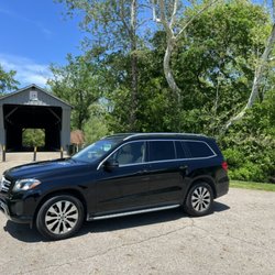 Passengers enjoying the Mercedes at the covered bridge in Canal Winchester!