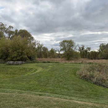 Hop Harvest & Vine - Grassy hill with picnic tables - Juice Bars & Smoothies Near Me - Pewaukee, Wisconsin