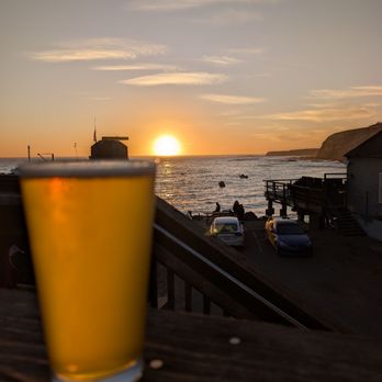 Wharf Master's Inn - Pier Place dining at sunset - Hotels Near Me - Point Arena, California Wharf Master's Inn - Pier Place dining at sunset - Hotels Near Me - Point Arena, California