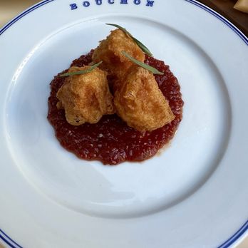 Bouchon - Cod Brandade (cod croquettes with tomato jam and tarragon).  We could have eaten 10 of these.  Delicious! - French Near Me - Las Vegas, Nevada