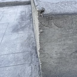 Corner of upper patio this is now breaking away and chipping. Three months after work was not completed. Corner of upper patio this is now breaking away and chipping. Three months after work was not completed.