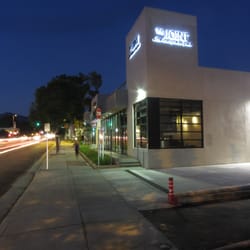 The Joint Chiropractic - The Joint, Glendale, at night.