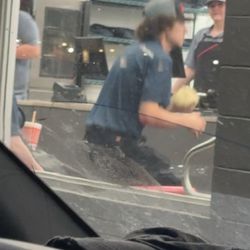 Domino's Pizza - Employee with no good safety gloves while handling food