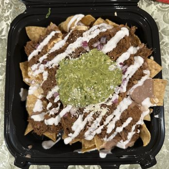 Mike's Red Tacos - Loaded Nachos without cilantro. Very crispy with so much Birria. - Tacos Near Me - San Diego, California Mike's Red Tacos - Loaded Nachos without cilantro. Very crispy with so much Birria. - Tacos Near Me - San Diego, California