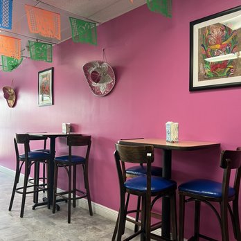 Las Flores Mexican - tables and chairs in a restaurant - Mexican Near Me - Miami, Florida