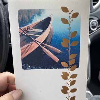 Rite Aid - a hand holding a card with a picture of a boat - Drugstores Near Me - East Meadow, New York Rite Aid - a hand holding a card with a picture of a boat - Drugstores Near Me - East Meadow, New York