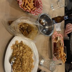 The Captain's Boil - Cajun fries, clams in a bag, seafood fried rice and lobster rolls