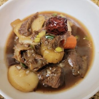 Tang 190 - Beef Rib Stew. Picture taken at home with personal bowls. - Korean Near Me - Irvine, California Tang 190 - Beef Rib Stew. Picture taken at home with personal bowls. - Korean Near Me - Irvine, California
