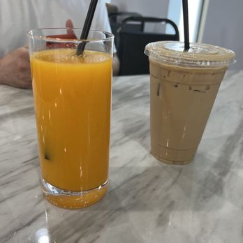 Munch Eatery - Mango Munch juice (freshly squeezed orange/mango blend) and a White Chocolate Mocha Iced Latte (both absolutely delicious) - Bakeries Near Me - Ansonia, Connecticut