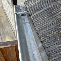 Gutter after cleaning Gutter after cleaning