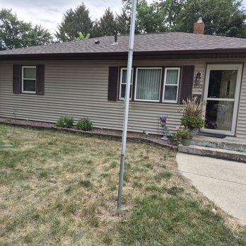 Hardyman Roofing - House with new roof and gutters and downspouts - Roofing Near Me - Monroe, Wisconsin