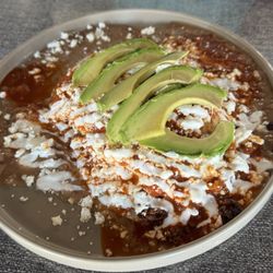 Esmeralda's Cafe - Huevos Rancheros on a tortilla and topped with chorizo.
