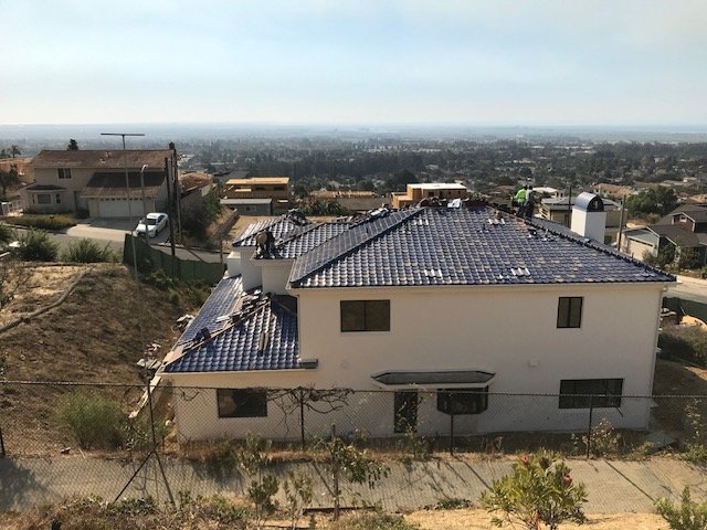 Slide of Shelter Roofing and Solar