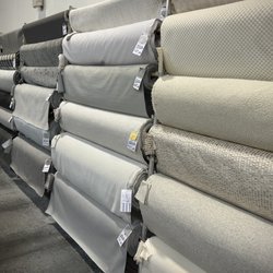 The Interior Alternative Fabric Outlet - Lots of whites, beiges, sands and other neutrals in stock for upholstery.  Many textures with overlapping colors to choose from