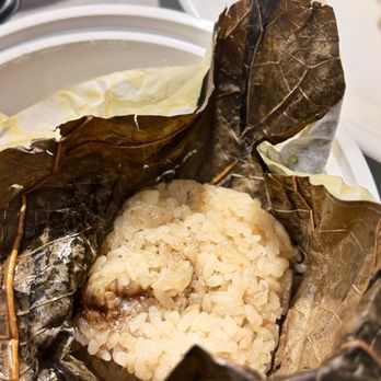 Dimsum Garden - Sticky Rice with Lotus Leaf (Lo Mai Gai) (2) - Dim Sum Near Me - New York, New York Dimsum Garden - Sticky Rice with Lotus Leaf (Lo Mai Gai) (2) - Dim Sum Near Me - New York, New York