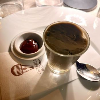 Osteria del Sostegno - Pistacchio gelato with hot chocolate sauce - Italian Near Me - Rome, RM Osteria del Sostegno - Pistacchio gelato with hot chocolate sauce - Italian Near Me - Rome, RM