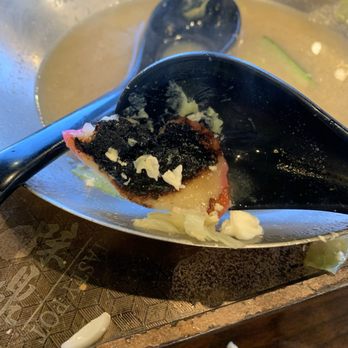 Tasty Pot - Burnt fish cake due to not stirring. - Hot Pot Near Me - Elk Grove, California